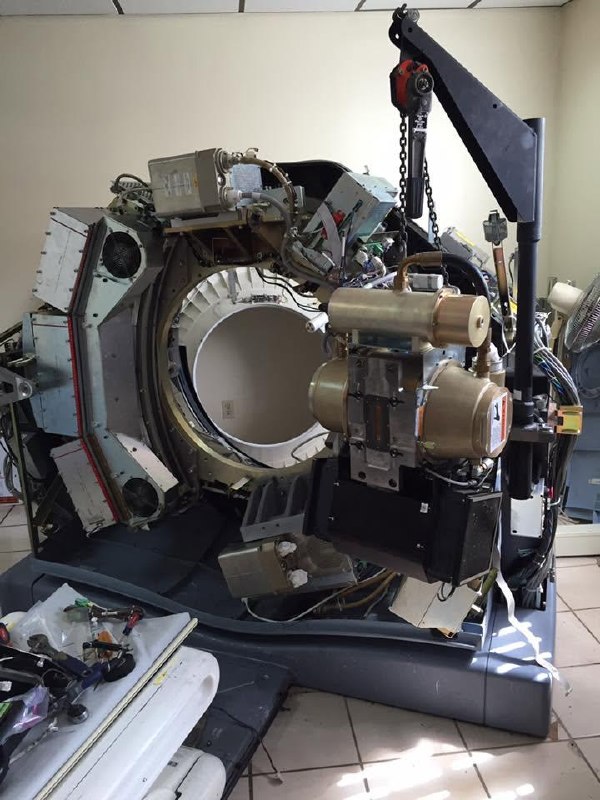 CT gantry opened for medical imaging service evaluation.